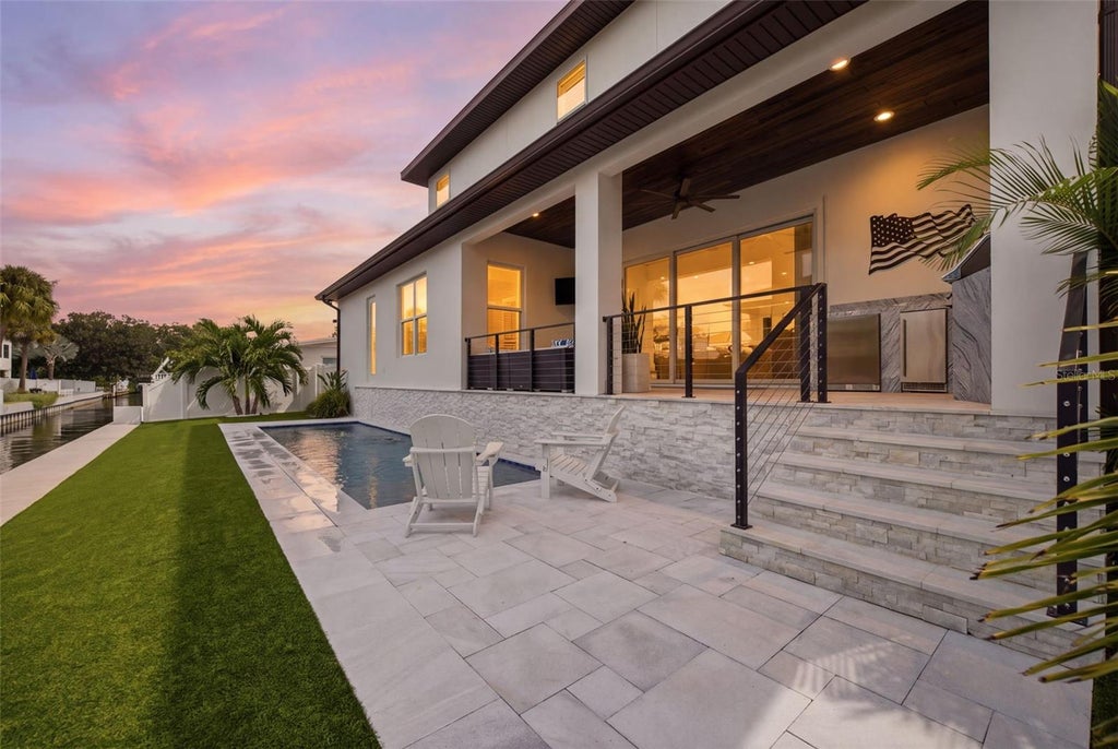 Photo of 4835 W Bay Villa Avenue, Tampa, FL 33611 (MLS # TB8555068)