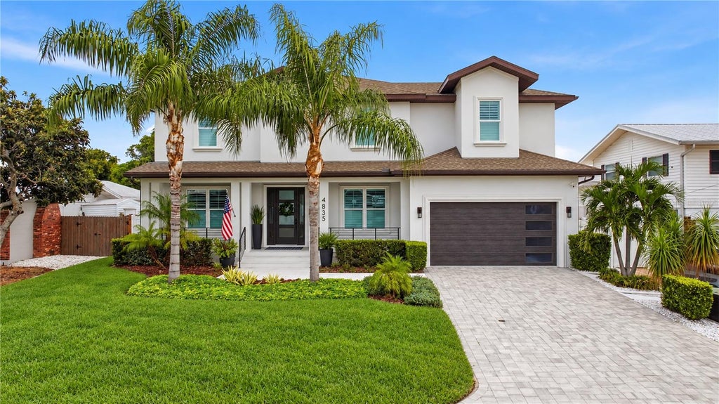 Photo of 4835 W Bay Villa Avenue, Tampa, FL 33611 (MLS # TB8555068)