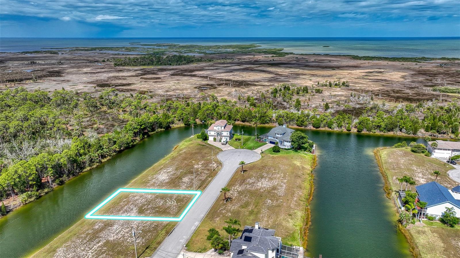 Amazing 75 ft x 100 ft lot with Seawall, close to boat ramp. Rear southern exposures in the hidden gem that is Hernando Beach South! Come Build your dream home in this beautiful community! Hernando Beach is a one of kind community that is surround by the Weeki Wachee Preserve, has multiple restaurants and shops that are all within walking distance. The world famous Weeki Wachee Springs and Weeki Wachee River are minutes away. Enjoy spending your weekends on the Hernando Beach ''Flats'' or a quick boat ride to Anclote or the Homosassa River to name a few quick destinations. The $306 annual Homeowners Association fee includes lawn maintenance until your new home is constructed and access to the community boat ramp. 3rd story views from your dream home could include views of the preserve and the Gulf of Mexico. There is a survey available. Water, sewer, and power connections are located at the street. Property is located in a flood zone so any home constructed will need to be elevated. R1b zoning for a single-family home. (Please note that lot lines shown on aerials are approximate.)