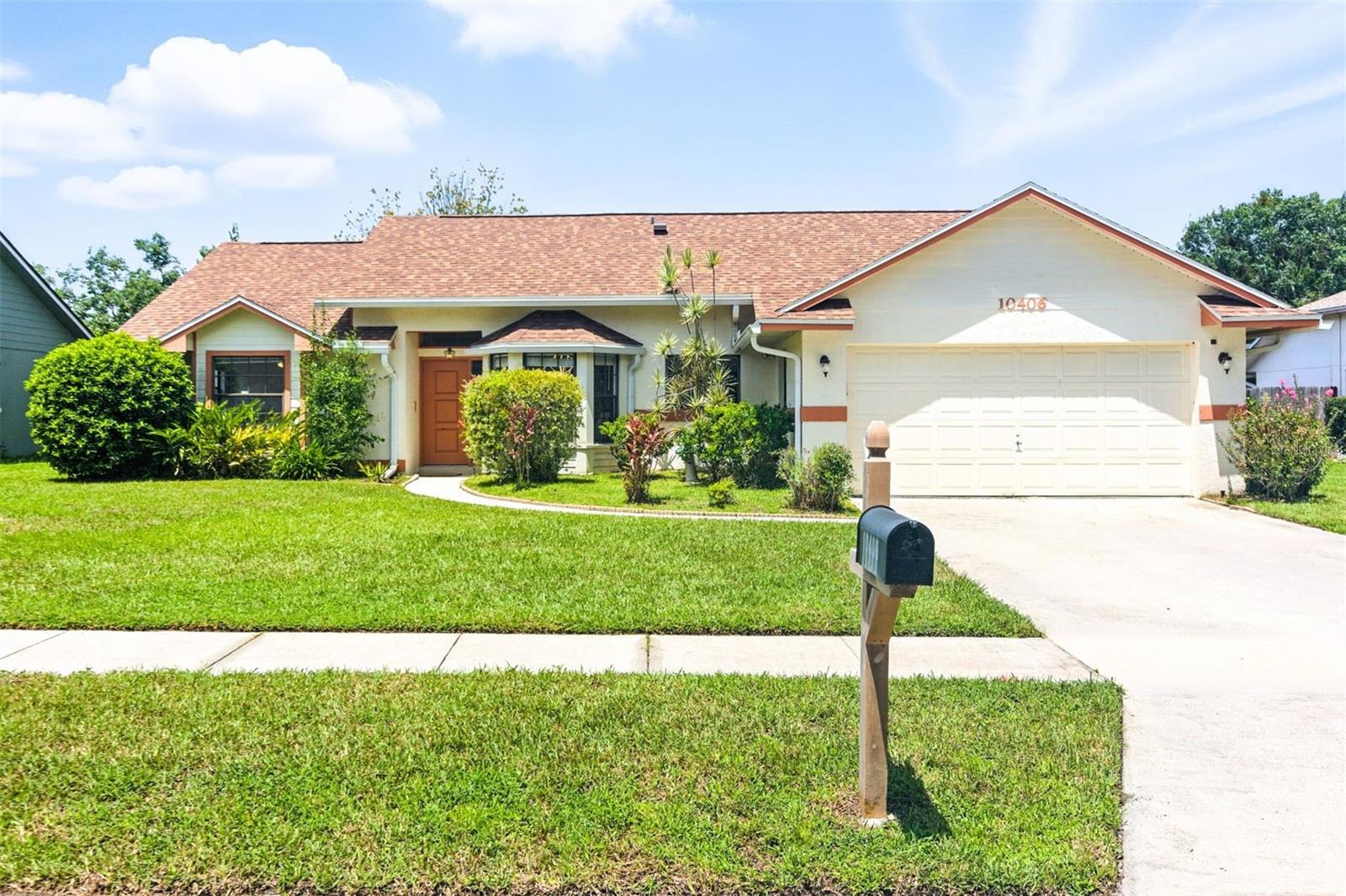 The Cypress Bay Retreat – Move-in ready and glowing with modern charm!! Tucked inside the highly sought-after Cypress Springs community—known for its sparkling lakes, winding sidewalks, and lush, oversized trees—this 3-bedroom, 2-bath retreat is a breath of fresh air. With over 1,450 sq ft of open, sun-drenched living space, this home is filled with natural light thanks to oversized windows and sliding glass doors—perfect for effortless indoor-outdoor living. A SPLIT FLOOR PLAN offers ideal privacy, while modern tile and vinyl flooring flow seamlessly throughout. The kitchen features 2022 stainless steel appliances and a BAY WINDOW BREAKFAST NOOK that feels straight out of a magazine. In the guest room, an oversized window seat adds charm and versatility, perfect for morning coffee or a cozy reading corner. The spacious primary suite includes a WALK-IN CLOSET, walk-in shower, dual sinks, and rich tile flooring. You'll love the extra storage between the large walk-in linen closet and the 2-car garage. Enjoy peace of mind with brand-new Vivint security equipment, professionally installed for modern safety and convenience. Out back, unwind on the fully SCREENED PORCH overlooking a lush, sprinkler-fed yard—your own peaceful slice of Florida living. From upgraded lighting to modern finishes, The Cypress Bay Retreat is stylish, functional, and will NOT last long!