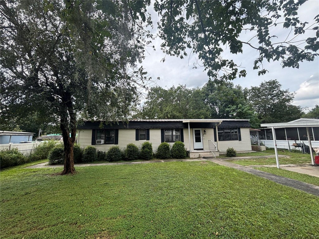 Photo of 3728 NE 59th Avenue, Silver Springs, FL 34488 (MLS # OM733772)