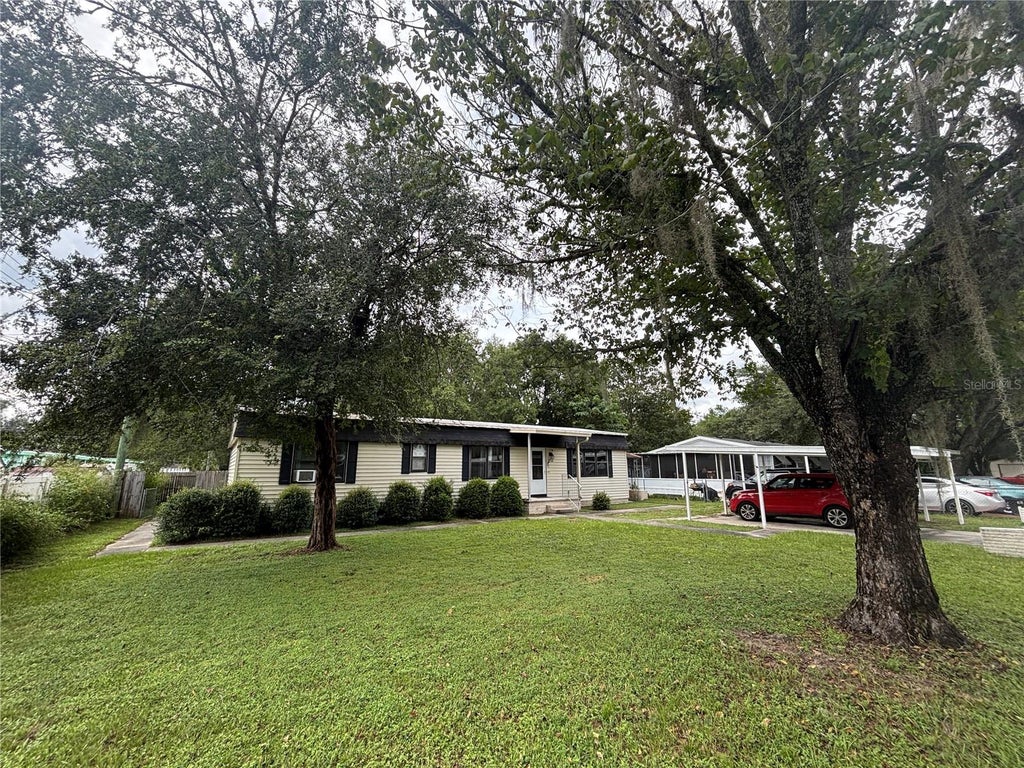 Photo of 3728 NE 59th Avenue, Silver Springs, FL 34488 (MLS # OM733772)