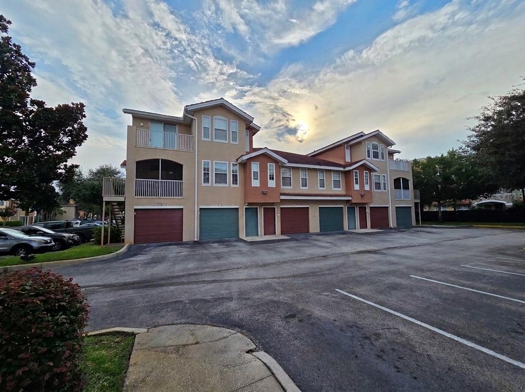 Photo of 12110 Poppy Field Lane #104, Orlando, FL 32837 (MLS # S5154723)