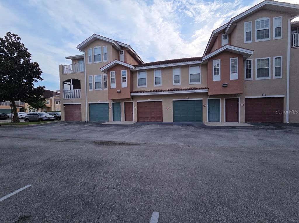 Photo of 12110 Poppy Field Lane #104, Orlando, FL 32837 (MLS # S5154723)