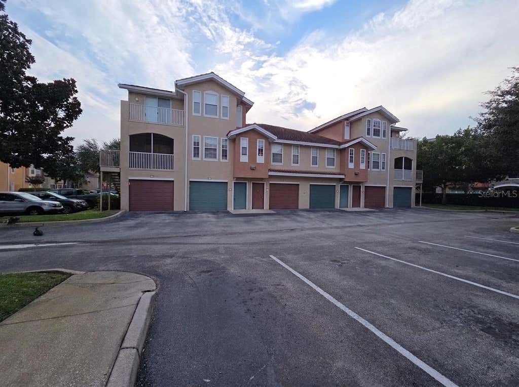Photo of 12110 Poppy Field Lane #104, Orlando, FL 32837 (MLS # S5154723)
