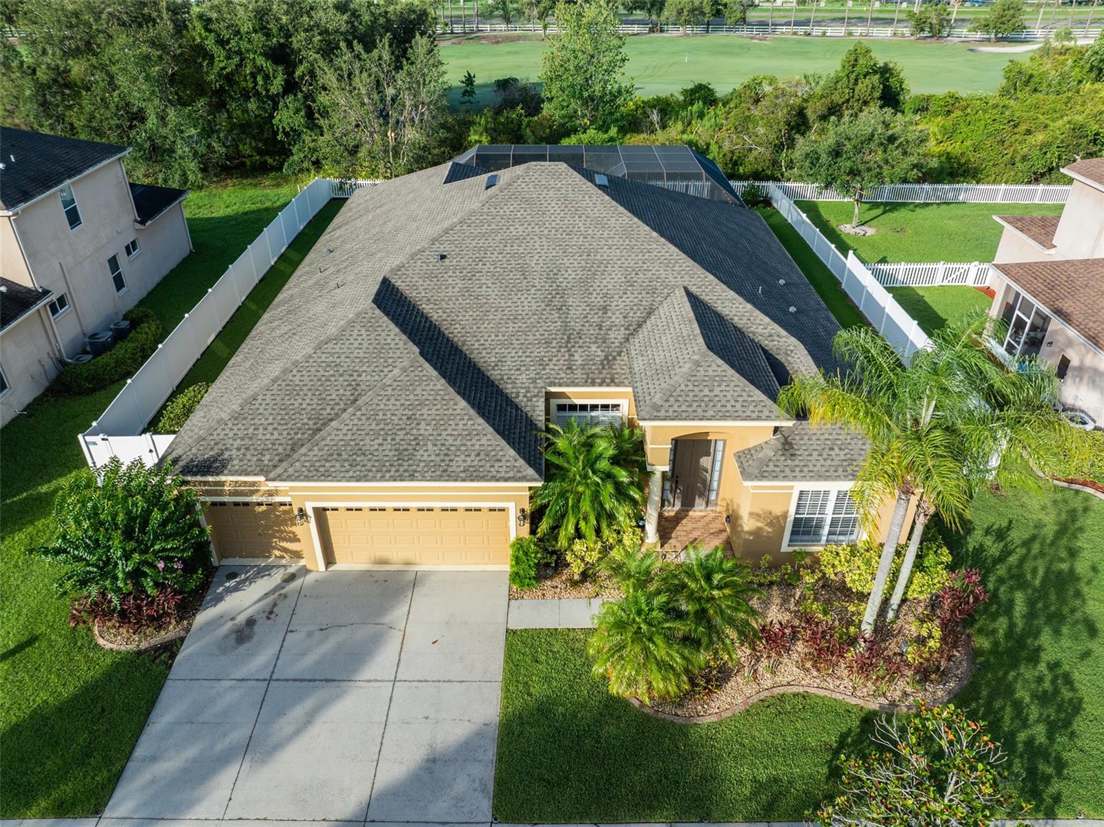 Discover the perfect blend of luxury, comfort, and convenience in this stunning 4-bedroom, 3-bath single-family pool home with a private office and bonus room, located in the highly desirable gated golf course community of Heritage Isles in New Tampa. Nestled on a tranquil conservation lot, this spacious residence offers over 3,100 sq ft of beautifully upgraded living space featuring crown molding, wainscoting, and a thoughtfully designed open floor plan. The chef-inspired kitchen boasts granite countertops, stainless steel appliances, upgraded cabinetry, and a large breakfast bar that flows seamlessly into the main living area—ideal for both daily living and entertaining. The luxurious primary suite includes a spa-like ensuite bath and expansive walk-in closet, while three additional bedrooms, a dedicated office, and a versatile bonus room offer space for work, play, or guests. Step outside to your private outdoor oasis with a heated saltwater pool, travertine deck, fenced yard, and serene views of the preserve and golf course. Residents of Heritage Isles enjoy resort-style amenities including a clubhouse, fitness center, pool with splash zone, tennis and basketball courts, playground, and onsite restaurant. Ideally situated just minutes from I-75, Wiregrass Mall, Tampa Premium Outlets, AdventHealth Wesley Chapel, and University of South Florida, and close to top-rated schools, movie theaters, nature trails, and dining hotspots. Enjoy easy access to downtown Tampa, Tampa International Airport, Raymond James Stadium, Amalie Arena, Busch Gardens, and Florida’s world-famous Gulf Coast beaches. This is Florida living at its finest—schedule your private tour today!