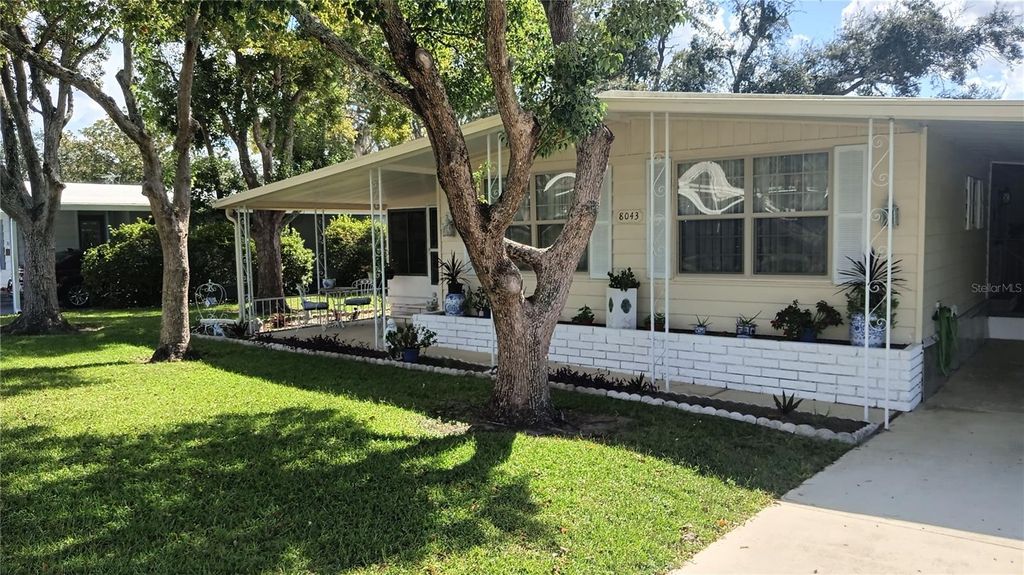 Photo of 8043 Little Tee Lane, Brooksville, FL 34613 (MLS # TB8429362)