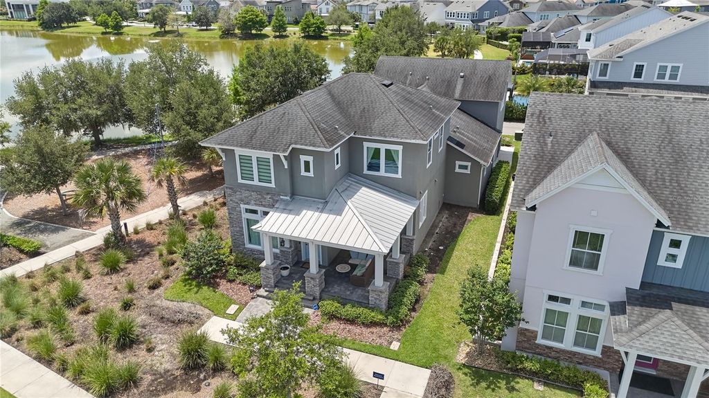 Photo of 8771 Betzig Alley, Orlando, FL 32827 (MLS # O6408876)