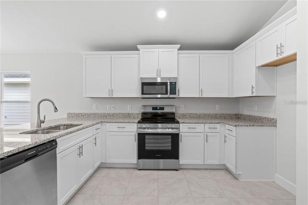 Photo of 15 Birchwood Drive, Palm Coast, FL 32137 (MLS # FC318526)
