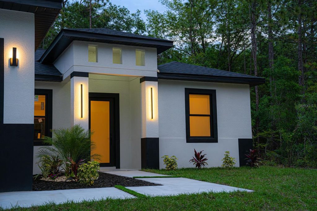 Photo of 14284 Cedarwood Avenue, Brooksville, FL 34614 (MLS # TB8497850)