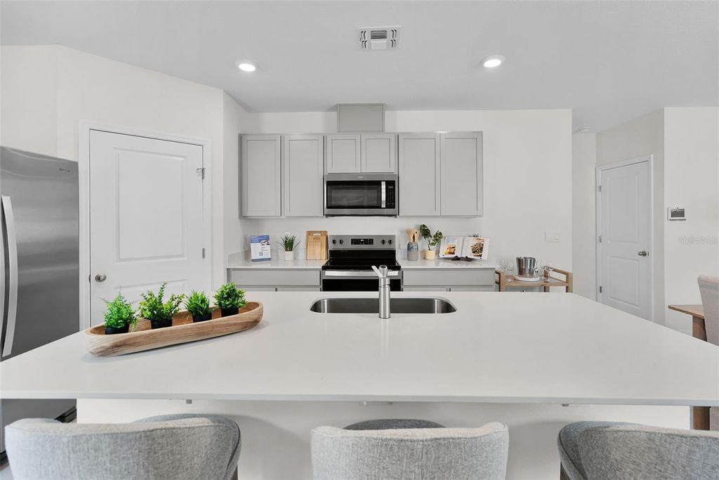 Photo of 5008 Oak River Street, Davenport, FL 33837 (MLS # O6366853)