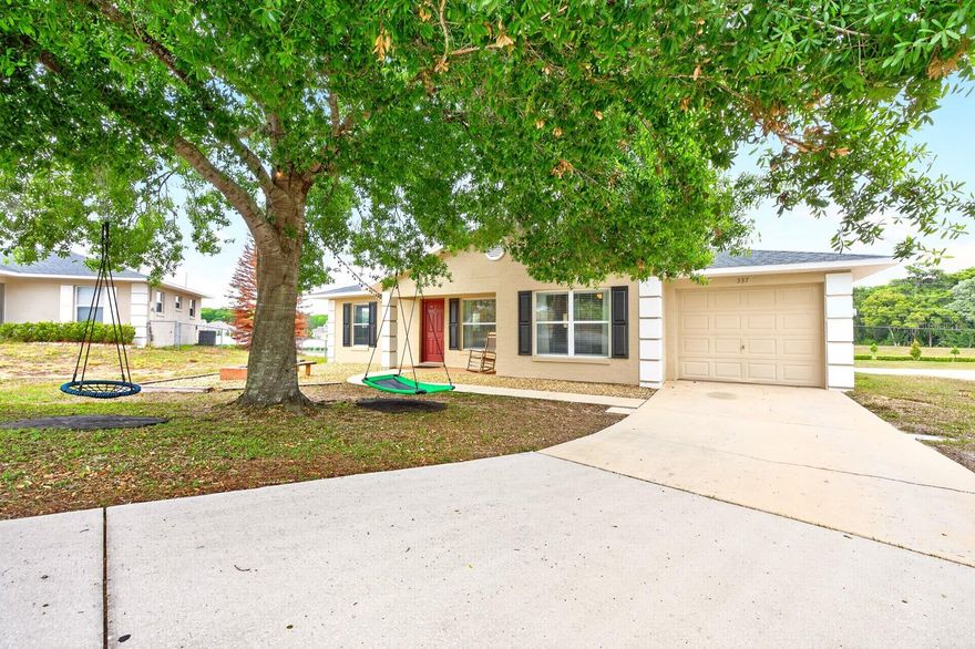 Welcome to this BEAUTIFULLY MAINTAINED 3-bedroom, 2-bath home in the peaceful Magnolia Ridge community of Tavares, where comfort, thoughtful upgrades, and outdoor living come together perfectly. Situated on NEARLY A QUARTER-ACRE LOT, this property offers plenty of space to garden, entertain, or create the backyard retreat you’ve always envisioned—all with the freedom of NO HOA. From the moment you arrive, the home welcomes you with a LARGE, LUSH OAK TREE that provides wonderful shade and timeless curb appeal, especially during relaxing Florida evenings. A spacious garage also features a DEDICATED WORKSHOP AREA added in 2020, ideal for hobbies, projects, or additional storage. Inside, you’ll find a BRIGHT, OPEN-CONCEPT FLOOR PLAN featuring the Living Room, Dining area, and Kitchen flowing seamlessly together, all enhanced by BEAUTIFUL CERAMIC TILE FLOORING throughout the entire home—NO CARPET anywhere. With lots of NATURAL LIGHT, the Living Room is designed for entertaining and relaxing, complete with a PROJECTOR and HOME THEATER SYSTEM (2020), creating the perfect setting for movie nights or game-day gatherings. The nearby Dining area features FRENCH DOORS that lead to the covered enclosed patio, blending indoor and outdoor living beautifully. Step outside and discover multiple outdoor living spaces thoughtfully added to maximize enjoyment of the spacious backyard. A NEW PAVER PATIO (2026) and an ADDITIONAL PAVER PATIO with DECORATIVE TRELLIS (2025) create charming spaces for outdoor dining, relaxing, or entertaining under the Florida sky. The Kitchen features abundant cabinetry, stainless steel appliances, a closet pantry, and a NEW SINK, NEW FAUCET, and NEW DISPOSAL added in 2025, combining style and functionality for everyday living. The SPLIT-BEDROOM FLOOR PLAN offers added privacy, with the generous primary suite tucked away from the secondary bedrooms. The Primary retreat features a walk-in closet and a beautifully UPDATED MODERN EN SUITE BATH, while two additional bedrooms and another full bath provide flexibility for guests, family, or a home office. Additional updates include NEW ROOF (2020), NEW AC (2020), NEW WATER HEATER (2020), UPDATED BLINDS, DRAPES, and WINDOW TREATMENTS throughout (2020), FRESH INTERIOR PAINT, RECENTLY POWER WASHED EXTERIOR, and NEW FANS AND LIGHT FIXTURES (2023)—making this home truly move-in ready. Located in Tavares, known as “America’s Seaplane City,” you’ll enjoy CLOSE PROXIMITY to the scenic Harris Chain of Lakes, offering endless opportunities for boating, fishing, waterfront dining, and outdoor recreation. You’re also just minutes from CHARMING MT. DORA, famous for its boutique shopping, art festivals, restaurants, and lakeside atmosphere. NEARBY ATTRACTIONS also include Wooton Park, local marinas, golf courses, farmers markets, and scenic nature trails, giving you plenty to enjoy year-round. With its MOVE-IN READY condition, stylish updates, spacious lot, and IDEAL LOCATION near the Chain of Lakes, this Magnolia Ridge home provides the perfect combination of comfort, charm, and RELAXED FLORIDA LIVING. Now is the time—don't miss your chance to call this Home!