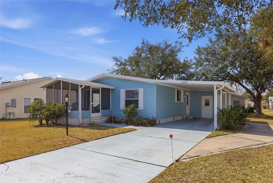 Welcome to 25323 Casa Del Lago Lane in Leesburg, located inside the highly desirable 55+ gated community of The Plantation at Leesburg. This well-maintained 2-bedroom, 2-bath manufactured home offers 1,040 square feet of light-filled living space with an open layout designed for comfort and easy living. Enjoy a screened-in lanai perfect for morning coffee or evening relaxation, along with a covered carport, storage area, and convenient interior laundry room. Residents enjoy 24-hour gated security and resort-style amenities including two 18-hole golf courses, three clubhouses, three pools, fitness centers, tennis, pickleball, shuffleboard, racquetball, walking trails, fishing ponds, and an on-site restaurant and bar, with over 100 weekly activities and clubs. Conveniently located near shopping, dining, medical facilities, and major highways with easy access to Orlando attractions and Florida’s coasts, offering an excellent opportunity to enjoy active, low-maintenance living in one of Leesburg’s most vibrant communities.