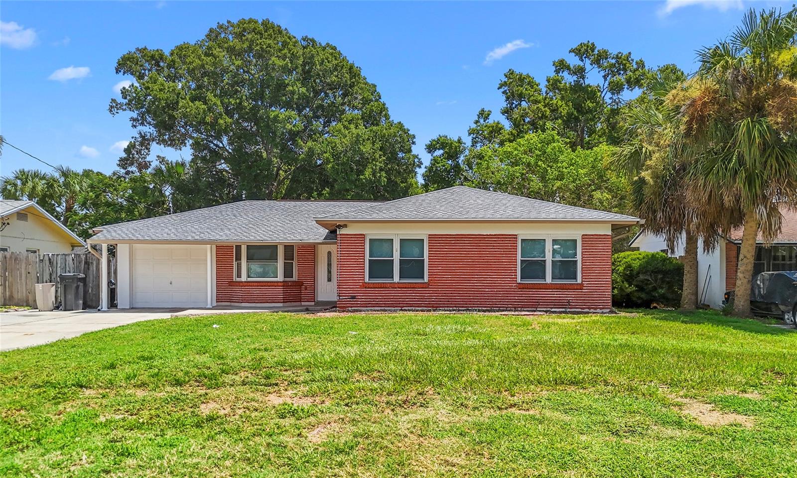 Live where others vacation—this Bay Crest gem offers the ultimate Florida lifestyle! Nestled in one of Tampa’s most sought-after waterfront communities, this beautifully updated 3-bedroom, 2-bath POOL HOME with a bonus office/flex room is just a few doors from the community boat ramp with access to the OPEN BAY. Love boating, entertaining, or relaxing outdoors? This home checks all the boxes. Inside, enjoy a spacious open layout with a large living room, updated kitchen featuring wood cabinets, stainless steel appliances, and a breakfast bar. The rear family room with fireplace adds a cozy touch and leads to a versatile 4th room—perfect for an office, playroom, or potential bedroom. Step outside to your own private backyard retreat with pool—ideal for year-round enjoyment. And the location? Minutes from International Plaza, Westshore, Citrus Park, and only 10 minutes to Tampa International Airport. Plenty of space to park your boat, plus quick access to the community launch. Florida living doesn't get better than this—schedule your tour today!