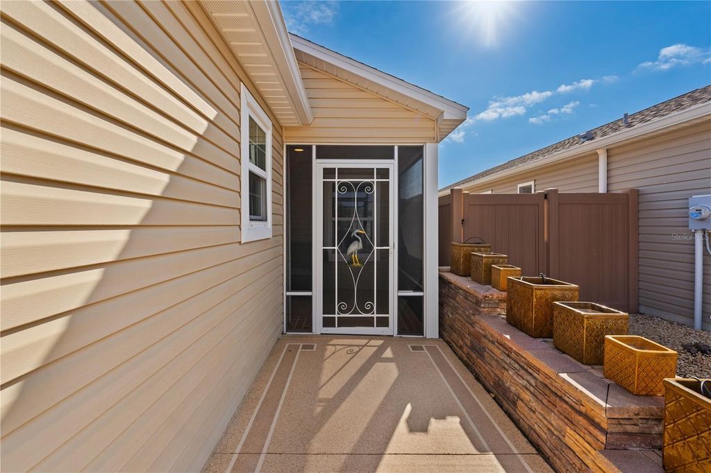 Photo of 5859 Tupelo Terrace, The Villages, FL 32163 (MLS # S5144201)