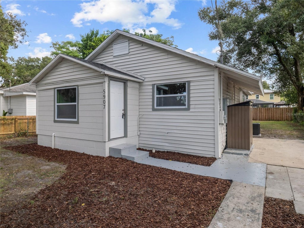 Photo of 5907 N 15th Street, Tampa, FL 33610 (MLS # A4711034)