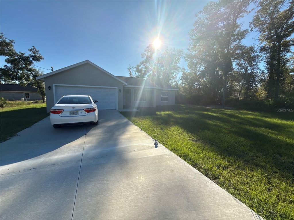 Photo of 18 Malauka Radial Terrace, Ocklawaha, FL 32179 (MLS # O6362455)