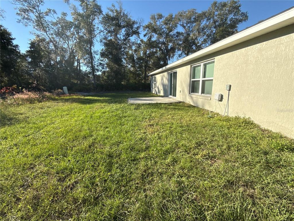 Photo of 18 Malauka Radial Terrace, Ocklawaha, FL 32179 (MLS # O6362455)