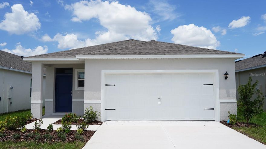 Under Construction. Magnolia Pointe presents the Harper, available to build in Umatilla, Florida. A front porch welcomes to you into one-story all concrete block construction home. Designed to optimizes living space with an open concept kitchen that overlooks the versatile great room and large covered lanai. The well-appointed kitchen features an island with bar seating, oversized walk-in pantry and sleek stainless-steel appliances! Bedroom one is located behind the kitchen and has an ensuite bathroom with double vanity and spacious walk-in closet providing substantial storage space. A second bedroom and bath are located at the rear of the home. Just off the great room is the versatile fourth bedroom, perfect to meet your needs. *Photos are of similar model but not that of the exact house. Pictures, photographs, colors, features, and sizes are for illustration purposes only and will vary from the homes as built. Home and community information including pricing, included features, terms, availability, and amenities are subject to change and prior sale at any time without notice or obligation. Please note that no representations or warranties are made regarding school districts or school assignments; you should conduct your own investigation regarding current and future schools and school boundaries.*