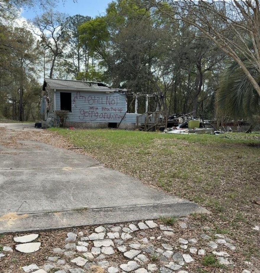 Investor special in Silver Springs! This .57-acre lot with R-4 zoning offers a prime opportunity for redevelopment. The existing mobile home has sustained fire damage and must be demolished and removed, making way for a new mobile or income-producing setup. With ample space and flexible zoning, this property is ideal for investors looking to replace with a new or used mobile home, create a rental, or hold for future appreciation. The lot size provides room for improvement while still maintaining privacy and usability. Bring your crew and your vision—this is a true value-add project with upside potential in a steadily growing area.