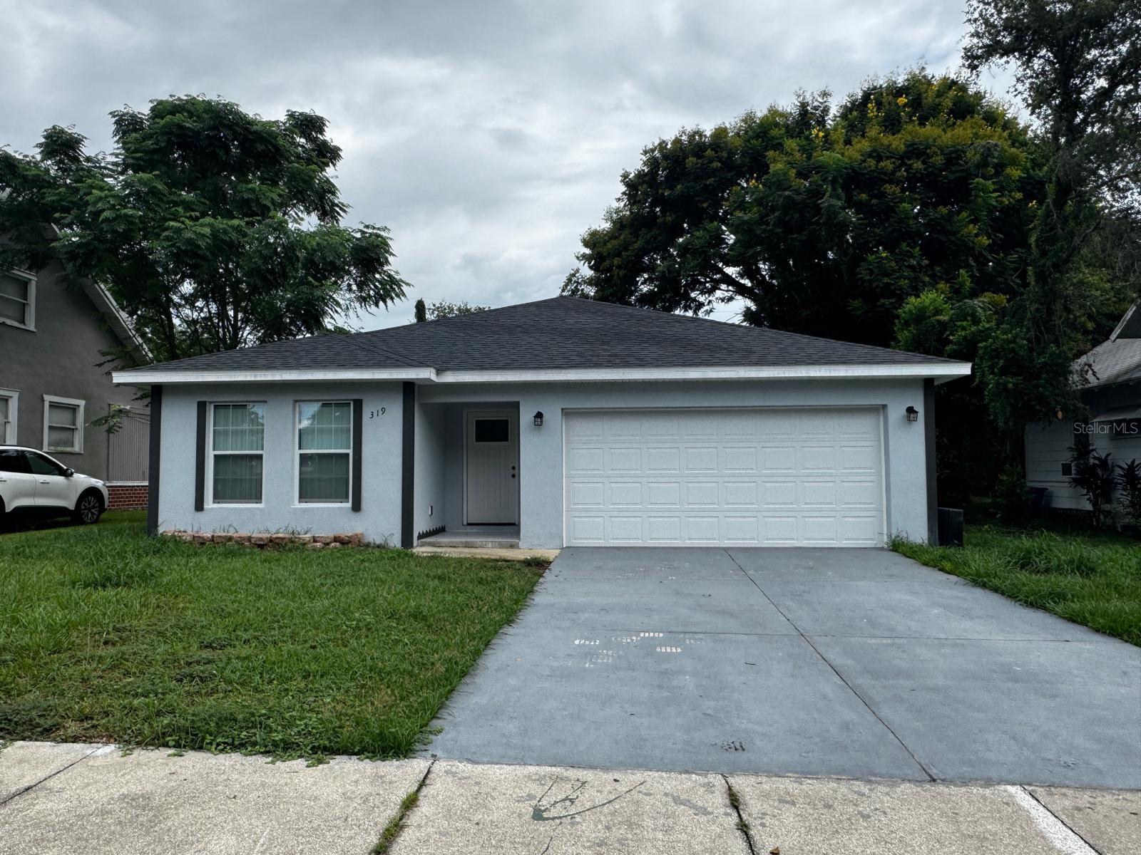 New Construction in Winter Haven! Built in 2024, this 3-bedroom, 2-bath home offers 1,560 sq. ft. of living space with a 2-car garage. Located on a large lot with an approved permit to build a mother-in-law suite. Features include tile floors throughout, spacious open layout, and kitchen with granite countertops. Conveniently close to hospitals, doctor offices, schools, Legoland, shopping centers, and just a short walk to downtown Winter Haven’s restaurants and entertainment. Easy access to Orlando and Tampa.