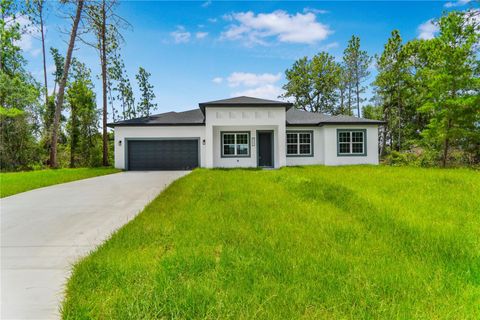 Photo of 5220 SW 128th Place, Ocala, FL 34473 (MLS # O6411932)