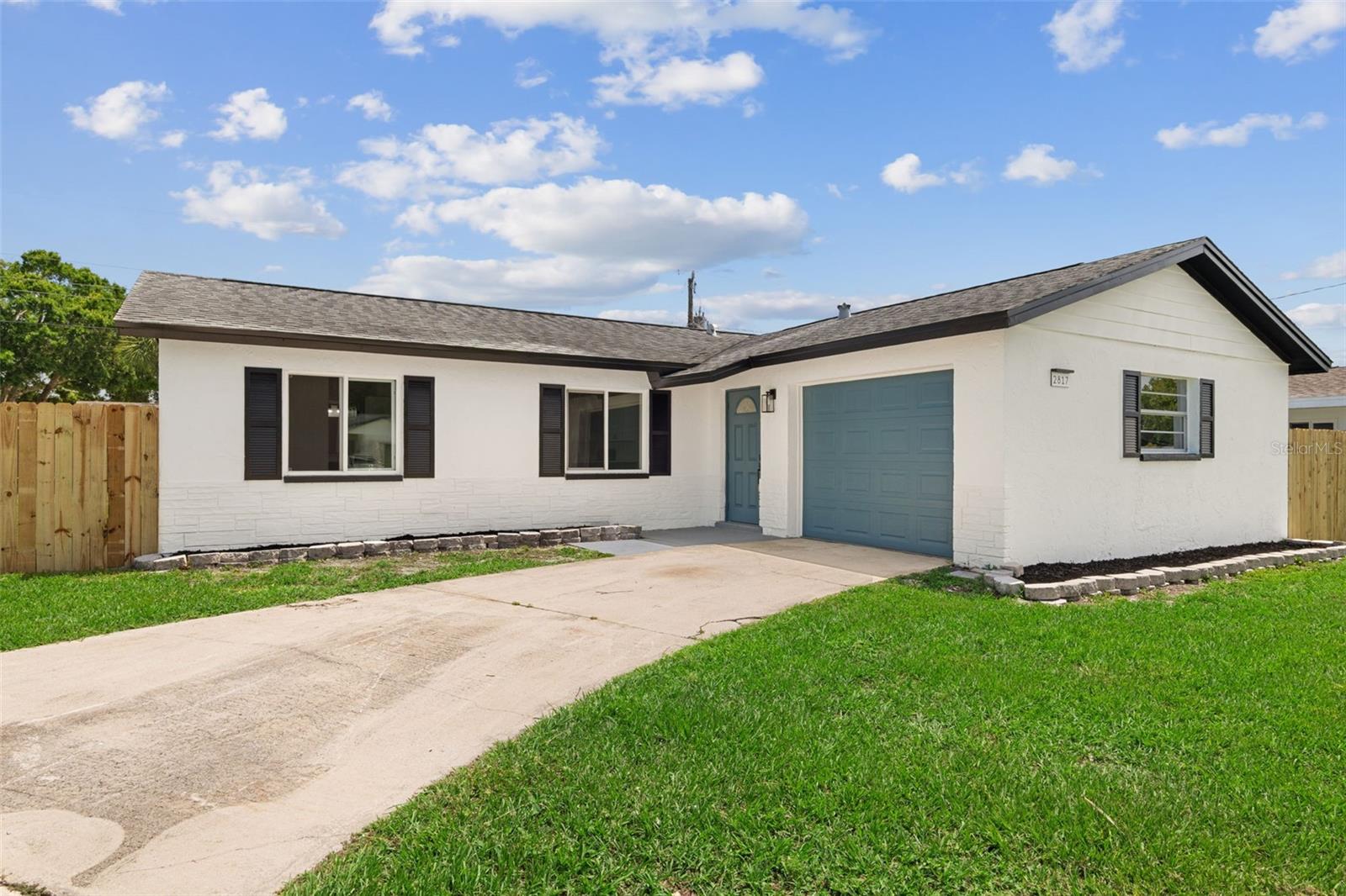 One or more photo(s) has been virtually staged. This fully updated 1742 sqft beauty features 4-bed, 2-bath in the heart of Melbourne! Open concept layout with a stunning L quartz island kitchen, soft close cabinets, pantry and stainless steel appliances, flowing into vibrant, modern spaces perfect for family or entertaining. Enjoy wood-look tile throughout, fully renovated bathrooms, and abundant natural light. The primary suite offers dual closets and a modern en-suite bath with a walk-in shower and a vanity with quartz countertop. In law suite or flexible bedroom attached with a private entrance, perfect for guests or income potential.
New AC and water heater. Proven durability with roof (16 yrs) and newer electrical panel.
Outside, enjoy a fenced yard, attached garage, and no HOA. This home is just minutes from schools, shopping, dining, and beach is only 15 min away.
Move-in ready! Price was reduced from original listing price because of the roof. Seller can put a new roof or give the credits for buyer closing costs but understand the price needs to be adjusted.
