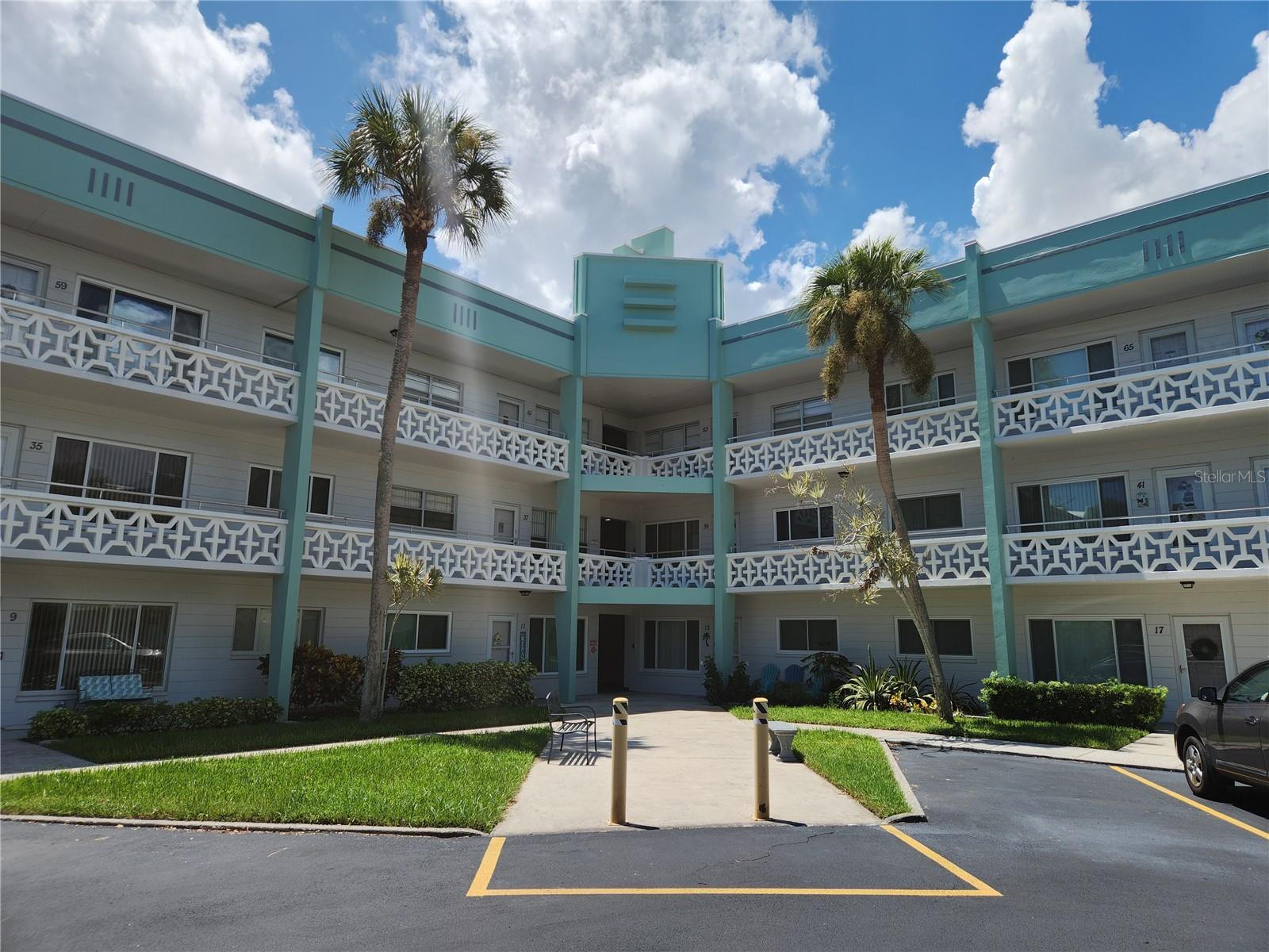 ON TOP OF THE WORLD 55+ COMMUNITY - MOVE IN READY 2 BED/2 BATH CONDO LOCATED RIGHT ACROSS FROM THE 9/18 HOLE GOLF COURSE. LAMINATE AND TILE FLOORING THROUGHOUT FOR EASY CLEAN UP. LOTS OF AMENITIES IN THIS 55+ COMMUNITY SUCH AS DANCES, SHOWS, CLUBS, LAWN BOWLING, HEATED POOL, SAUNA, TENNIS, GOLF AND BEST OF ALL A STATE OF THE ART GYM. CLOSE TO GREAT SHOPPING, RESTAURANTS, BEAUTIFUL BEACHES AND MUCH MORE.