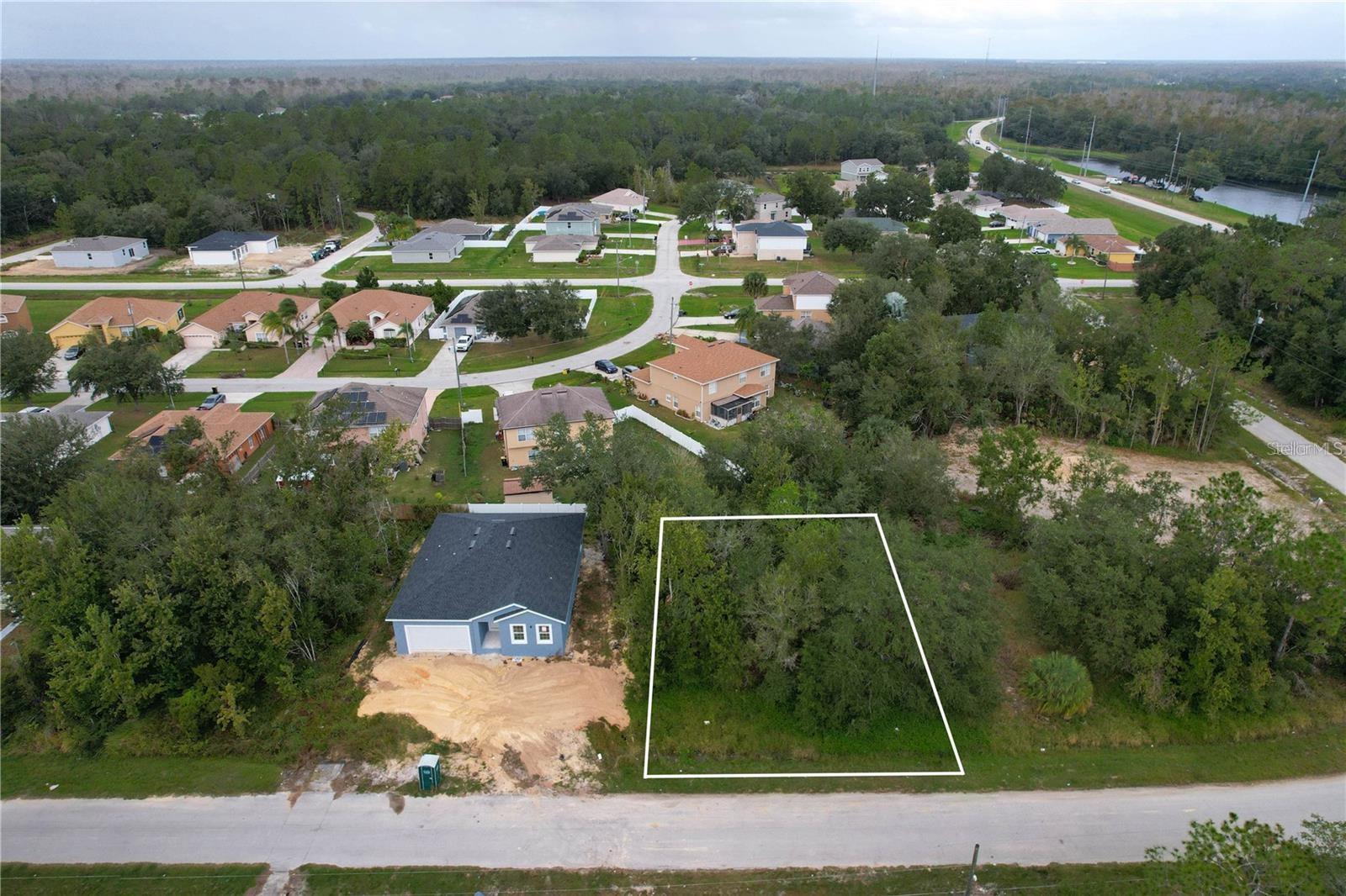 This vacant lot offers the perfect chance to build your dream home in a well-established community with exceptional amenities. Residents enjoy access to two community centers, a fitness and community pool.
The lot is ideally situated between completed homes, providing both a sense of community and a tranquil, peaceful setting. Conveniently located near a medical center, doctors’ offices, shopping, and community colleges, this location offers everyday convenience. Plus, you’ll be just a short drive from Disney.