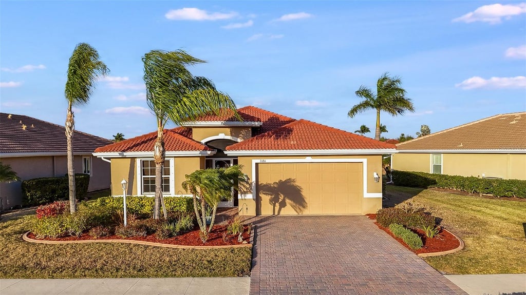 Photo of 7486 Talon Bay Drive, North Port, FL 34287 (MLS # C7530047)
