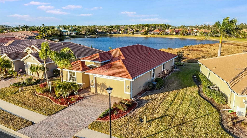 Photo of 7486 Talon Bay Drive, North Port, FL 34287 (MLS # C7530047)