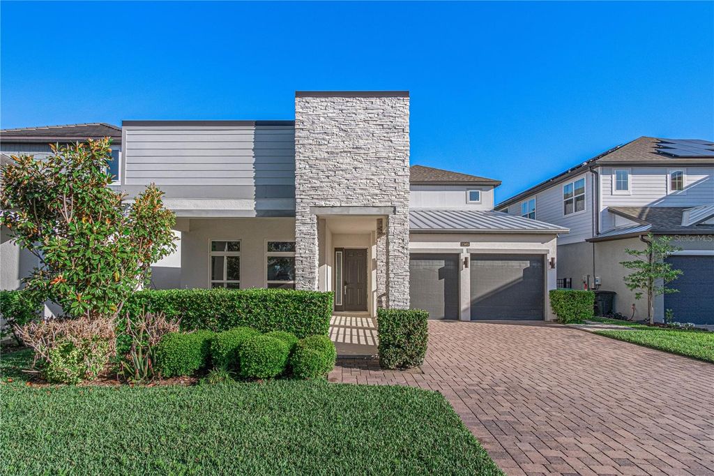 Photo of 7505 Alpine Butterfly Lane, Orlando, FL 32819 (MLS # O6400550)