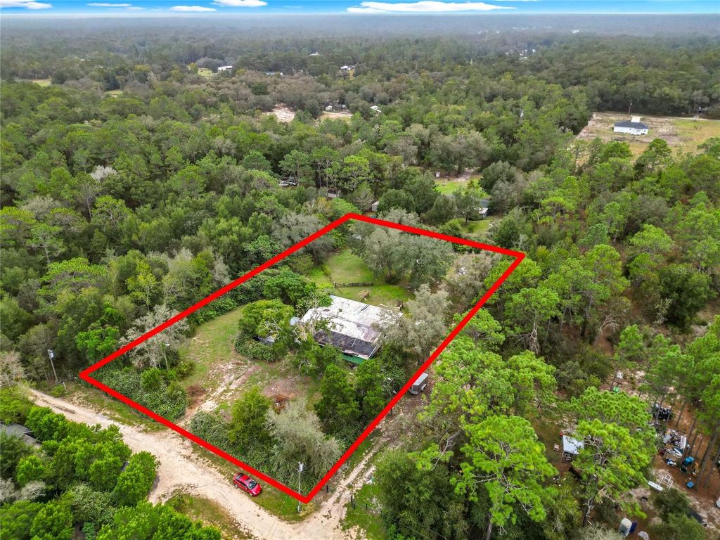 Photo of 13300 SW 91st Place, Dunnellon, FL 34432 (MLS # A4621340)