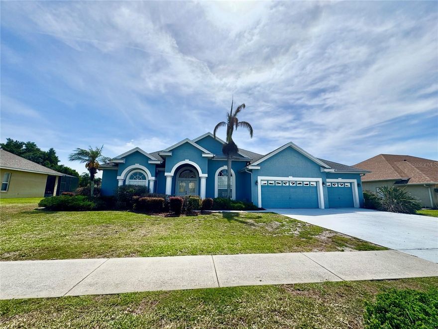 BRAND NEW ROOF! NO CARPET! Welcome to this 4 bedroom 3 bath pool home overlooking a pond in gated Millers Landing.  Formal living room and dining room.  Kitchen with Cambria quartz counters, backsplash and solid wood cabinets. Breakfast bar and kitchen nook overlook large family room with a slider to the pool area.  Split bedrooms.  Primary Bedroom with slider to the covered patio.  En Suite bathroom with garden tub, separate vanities with quartz counters, and stall shower.  Ceiling fans in all bedrooms.  Ceramic tile and laminate wood floors throughout. Inside laundry room. Covered Lanai overlooking the in ground pool with screened enclosure and a view of the pond.  Pool area has access to the 3rd full bathroom.  Home has a 3 car garage, irrigation system, intercom system and an alarm.  Near Restaurants, Shopping and Recreation like Legoland, Winter Haven Chain of Lakes and the brand new Winter Haven Recreation and Cultural Center.