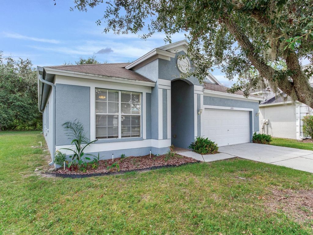 Photo of 17433 Lawn Orchid Loop, Land O Lakes, FL 34638 (MLS # TB8436943)