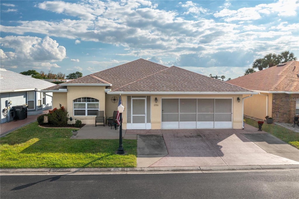 Photo of 656 Sweetwater Way, Haines City, FL 33844 (MLS # P4939937)