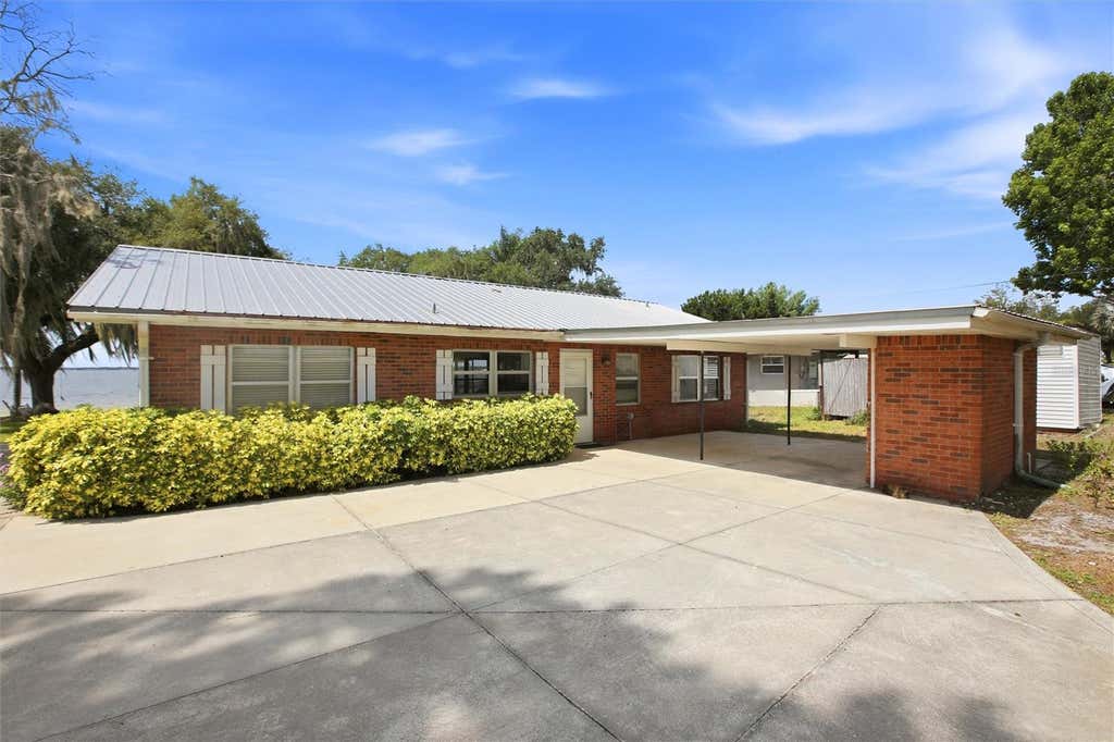 Photo of 836 Lake June Road, Lake Placid, FL 33852 (MLS # P4939371)