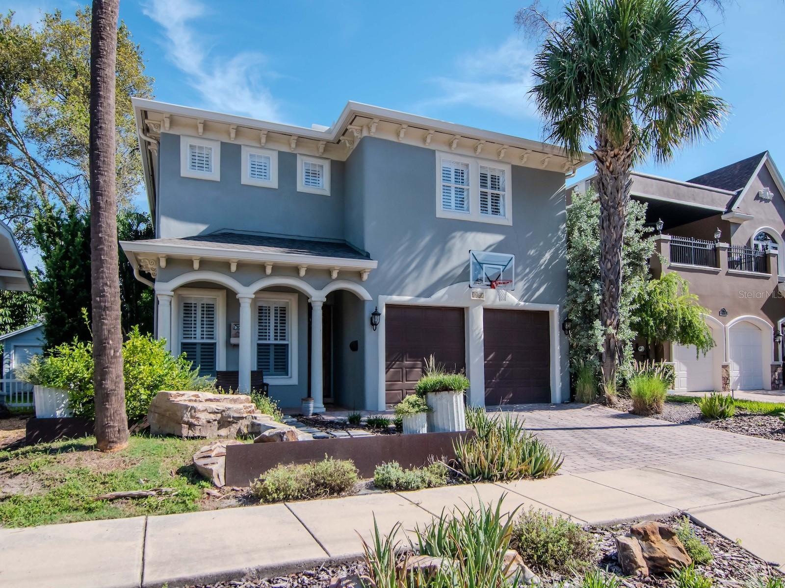 Welcome to this beautifully updated home in the heart of Palma Ceia Park in a top-rated school district where every detail has been thoughtfully designed - blending luxury upgrades with everyday functionality. This stunning home features a fully renovated chef’s kitchen with GE Café appliances, 2-zone wine fridge (reds and whites), Sharp drawer microwave, 6-burner gas range including a wok burner, custom backsplash, huge island with lots of additional storage and cookbook shelves, large single bowl stainless steel sink, new lighting including under the cabinet lighting, custom tile detail over the cooktop, granite counters, 42” cabinetry with crown detail, 2 pantries and a trash pull-out. The adjacent spacious family room has a gas fireplace, brick accent wall with twin built-ins on either side, and is open to both the kitchen and dining room. Located at the front of the home is a home office (French doors for privacy) or it could easily serve as a more formal space – a baby grand piano would be perfect in this space. The primary suite boasts an oversized bedroom, a massive custom closet, and a second closest for additional clothes, shoes or storage. The primary bathroom features a double vanity with undermount sinks, raised granite counter, jetted soaking tub, large walk-in shower with bench and two shower heads, linen closet, and a private WC. All secondary bedrooms are oversized with generous closets. The upstairs laundry room has upper and lower cabinets and a hanging bar. The downstairs powder room is outfitted with upgraded Kohler fixtures. Additional features to note: staircase risers with custom mosaic tiles, solid 8’ doors, plantation shutters and wood blinds throughout, crown molding, surround sound in family room, 1st level hallway, primary suite, and back porch. The pool and pavered deck are a lovely private oasis, and the backyard is completely fenced. Recent updates include new roof (2025), 1st-floor HVAC condenser (2025), 2nd-floor HVAC (2024), and tankless gas water heater (2023). Palma Ceia Park is centrally located in South Tampa – walk to restaurants and The Bayshore and MacDill AFB, downtown Tampa and Water Street, Selmon Expressway and all major roads and shopping are just a short drive away. The following are not warranted: front and backyard fountains and water softener. Sellers and previous owners never had the need to use the pool heater; therefore, it is not warranted.