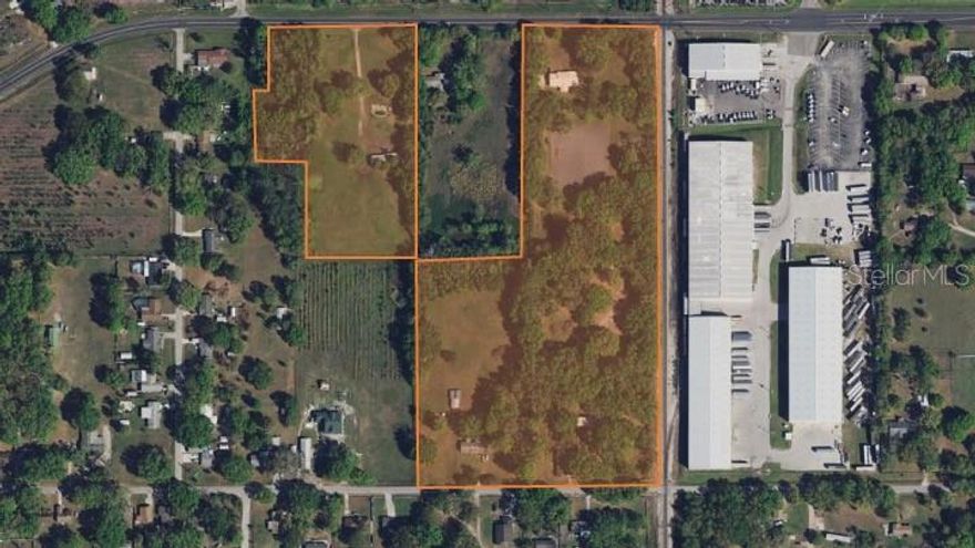 Great Industrial Zoned Property next to CRX tracks and Saddle Creek Distribution Center on Saddle Creek Road.  There are 5 parcels up for sale, 10 acres are zoned industrial and 10 acres will need a rezone, but the properties are contiguous in an Industrial area.  Currently, there are five structures built on the property, but are all available to either use or take down for industrial use.  In addition a CRX spur line going to Saddle Creek Distributors runs by the property, providing an inexpensive spur line option.  One of the parcels is non contiguous with this listing and owner, but a parcel that makes everything contiguous is also available for and additional purchase with the owner through our office.