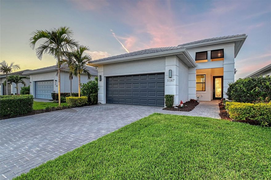 MOTIVATED SELLER!  LOOK!  IT'S YET ANOTHER HUGE PRICE REDUCTION!  Discover lakefront luxury in this exquisite Summerland model, nestled in Cresswind, Lakewood Ranch’s premier 55+ gated community. This 2-bedroom, 2-bath home with a versatile den showcases breathtaking lake views from an extended paver lanai—perfect for serene mornings or fun filled evening gatherings with shimmering water and distant tree line as your backdrop. Crafted by Kolter Homes, with over 20 years of experience, this builder is recognized for quality construction, innovative designs, and creating vibrant communities, earning awards like the 2016 Southeastern Builder’s Conference Awards. This home embodies their “Built Around You” philosophy with personalized designs tailored to buyers’ lifestyles.
Step inside to an open-concept great room bathed in natural light, flowing seamlessly into a gourmet kitchen that exudes modern elegance with its upgraded 42” white cabinetry, crown molding, soft-close drawers, granite countertops, a chic hexagon backsplash, and premium stainless steel appliances, including a high-performance gas stove for culinary enthusiasts. The kitchen’s bright, airy feel is accentuated by its clean lines and ample counter space, ideal for entertaining or casual meals. The primary suite, overlooking the tranquil lake, is a serene retreat with LVP flooring, expansive windows framing picturesque water views, and a spa-inspired bath with frameless glass shower, tiled walls extending to the ceiling, and a custom vertical accent—perfect for unwinding. The second bath has a raised-height vanity, granite countertops, and extended tile. The laundry room has stunning custom cabinetry—sleek, white, and modern ($12,000+ cost), offering exceptional storage and a gas dryer, blending practicality with elegance. Throughout, LVP flooring, today’s modern motif, and 5 ¼” baseboards create a contemporary yet timeless aesthetic.
Outside, the lakefront lanai, equipped with six LED hi-hats on a dimmer switch, creates an inviting ambiance for entertaining, with added peace of mind from hurricane protection features. The lanai’s paver flooring offers unobstructed views of the lake with lush greenery for a serene escape. Upgrades like a full-lite front door with decorative glass, aluminum gutters, a belt-drive garage door opener, and an epoxy-coated garage floor ensure beauty and durability.
Cresswind’s resort-style amenities redefine active adult living: enjoy resort and resistance pools, the SmartFIT Training Center, pickleball, tennis, bocce, and a vibrant social calendar curated by a full-time lifestyle director. Nestled in Lakewood Ranch, the nation’s #1 master-planned community, you’re surrounded by world-class amenities. Shop and dine at University Town Center (UTC) Mall or Waterside Place, with local favorites like Grove and Selva. Top-rated schools, including Gullett Elementary and Lakewood Ranch High, and colleges like State College of Florida, make this ideal for multigenerational connections. Lakewood Ranch Medical Center offers premier healthcare nearby. Sports enthusiasts will love the world-famous soccer fields at Premier Sports Campus, while outdoor lovers can explore Summerfield Park’s trails. Just 12 miles away, the sugar-white sands of Siesta Key and Lido Beach offer endless coastal adventures.
This lakefront Summerland gem combines rare beauty with an unmatched lifestyle. Don’t miss your chance to live life better in Cresswind.