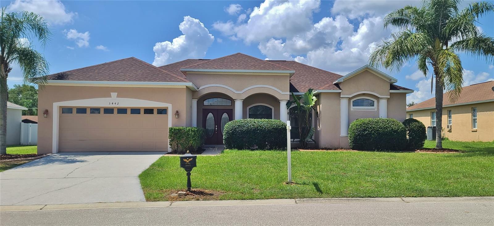 Discover your sanctuary in a vibrant location. Just minutes away from everything but tucked away in a peaceful spot away from noise and daily chaos. This expansive 3-bedroom, 2-bathroom home is a haven of comfort, featuring a sprawling yard and a cozy covered patio and screened pool perfect for entertaining or simply enjoying the Florida weather with a cup of coffee. Enjoy the added perks of NO CDD fees and minimal HOA. With a NEW ROOF April 2025, NEW CARPET, and NEW A/C to be installed at closing so the warranties will convey to the Buyers. Minutes away from dining, shopping, comprehensive medical facilities. This home is perfectly situated for both relaxation and excitement. This home is priced to sell, so act fast. Don't let it slip away.