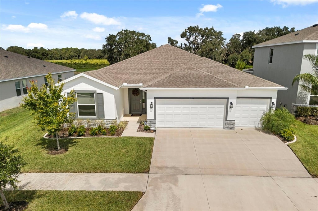 Photo of 6016 Wandering Willow Drive, Wesley Chapel, FL 33545 (MLS # TB8550185)