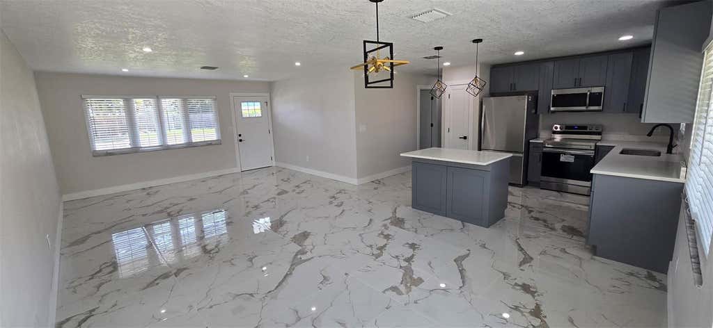 Photo of 965 Vignoles Avenue NE #1, Palm Bay, FL 32905 (MLS # C7529446)