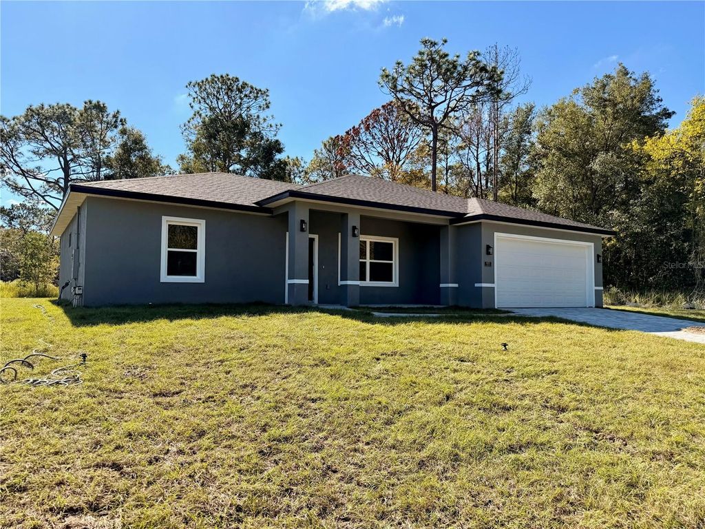 Photo of 9575 N Langdon Road, Citrus Springs, FL 34434 (MLS # O6353814)