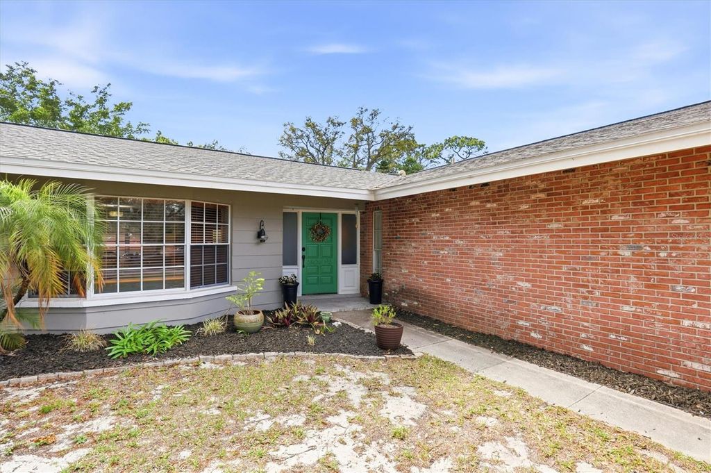 Photo of 1143 Lancer Lane, Tarpon Springs, FL 34689 (MLS # TB8490276)