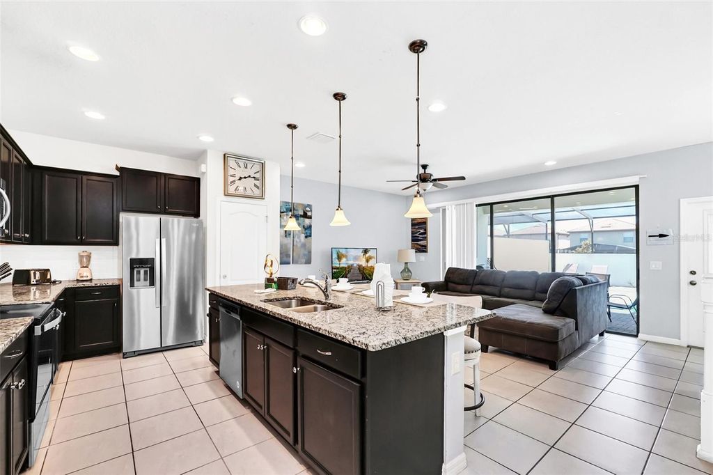 Photo of 8930 Sydney Avenue, Kissimmee, FL 34747 (MLS # O6421749)