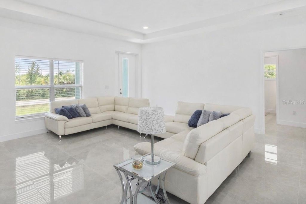 Photo of 15473 Lakeland Circle, Port Charlotte, FL 33981 (MLS # O6402109)