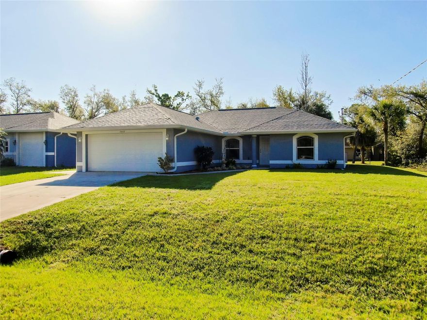THE BEST PRICE IN THE AREA! Discover your Florida dream home in the heart of North Port! This beautifully updated, custom-built, one-owner home offers 3 bedrooms, 2 bathrooms, and a 2-car garage—no HOA, no deed restrictions, and no flood zone. Perfect for first-time buyers, retirees, snowbirds, or investors.

Built in 2006, this home features 1,459 sq. ft. of open-concept living with a split-bedroom floor plan and cathedral ceilings. Freshly painted inside and out, bright, and move-in ready! Enjoy peace of mind with a NEW ROOF (2024), new hot water heater, gutters, downspouts, storm shutters, and a hurricane-rated garage door. The updated kitchen features solid-surface countertops, new range, microwave, and garbage disposal. New carpet in the living room and primary suite plus custom window treatments add a fresh, cozy touch.

Relax outdoors in the spacious backyard with fresh topsoil for leveling—ideal for pets, gardening, or a future pool. The large patio is perfect for BBQs, entertaining, or soaking up the Florida sunshine.

Located near top-rated Sarasota County schools, Warm Mineral Springs, North Port Aquatic Center, Wellen Park, and Gulf Coast beaches including Venice Beach, Manasota Key, and Siesta Key. Easy access to I-75, airports, and nearby Port Charlotte, Punta Gorda, and Englewood.

Don’t miss this move-in ready North Port gem with no HOA or CDD fees! Schedule your private showing today!