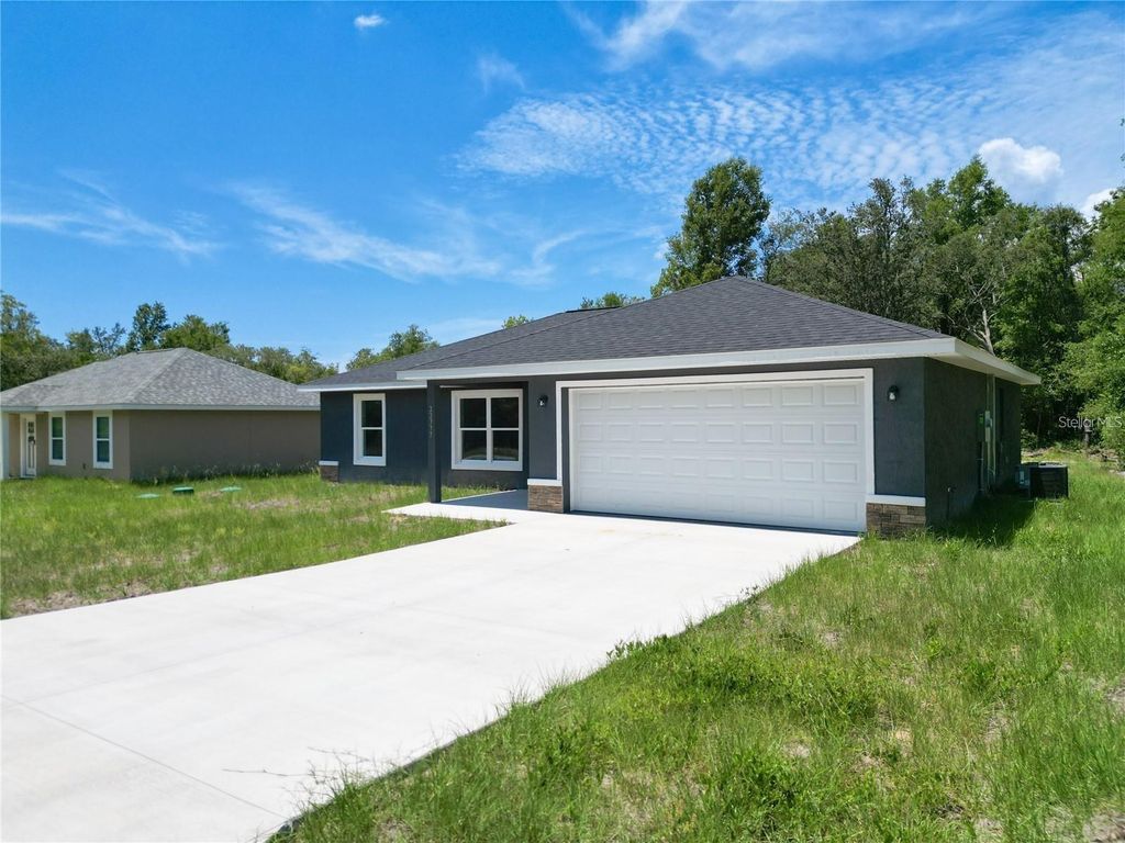 Photo of 22777 SW Beach Boulevard, Dunnellon, FL 34431 (MLS # OM711087)