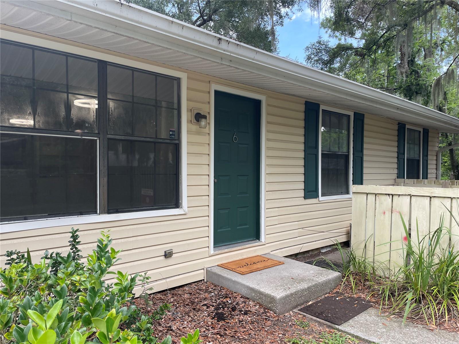 Cute, Clean, Quiet & Convenient Condo: This charming 2-bedroom, 1-bath ground-floor condo with all new LVP flooring and new paint is just minutes from the University of Florida and less than one mile from UF Health Shands Hospital. Located in a quiet community, this home offers a peaceful retreat with easy access to campus, hospitals, shopping, and dining. Public transportation is close by, with several RTS bus routes making commuting around Gainesville a breeze.